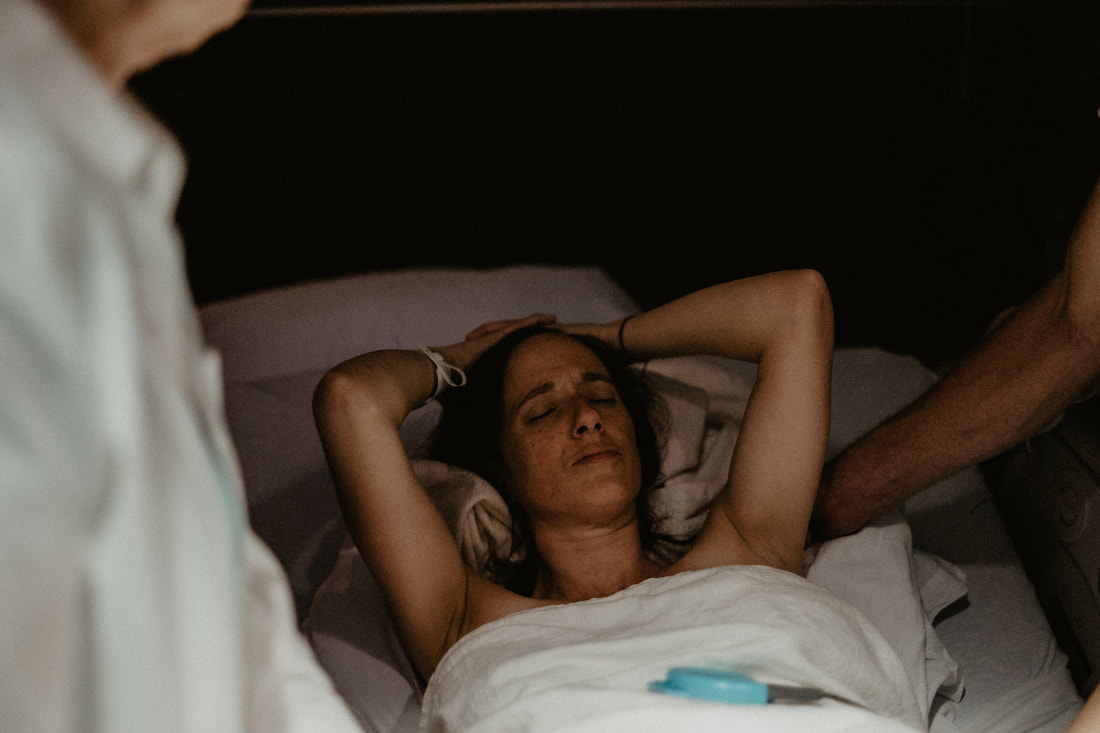 Katie in the transitional phase of labor during her natural childbirth, photo by Gathered and Found Greenville South Carolina Birth Photography